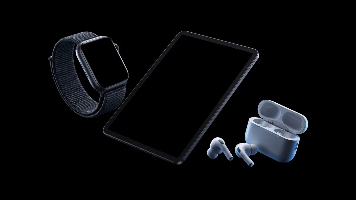 Aparelhos do ecossistema — iPhone, Watch e AirPods — lado a lado.